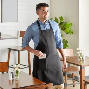 Delantal con pechera estándar de poliester negro con dos bolsillos 86 x 76 cm Choice (Precio por 12 piezas)